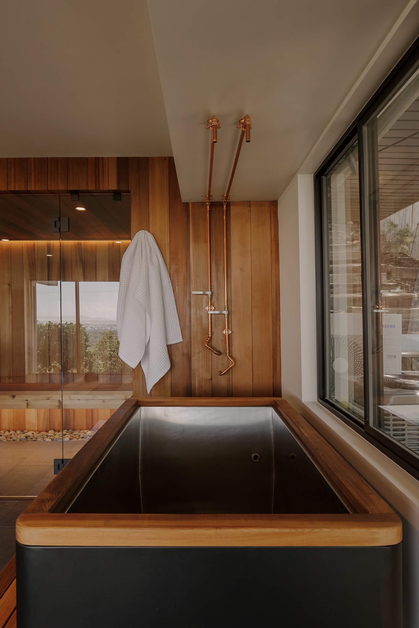 Purpose-built cold plunge beside the sauna